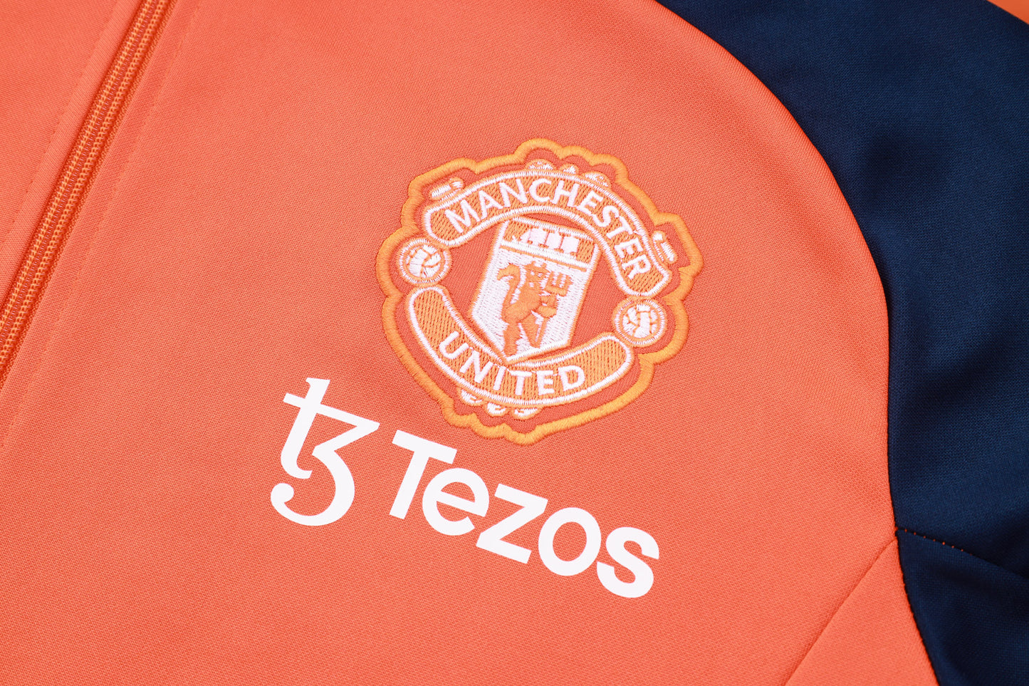 2024/25 Manchester United Presentation Orange/Navy Adults Tracksuit