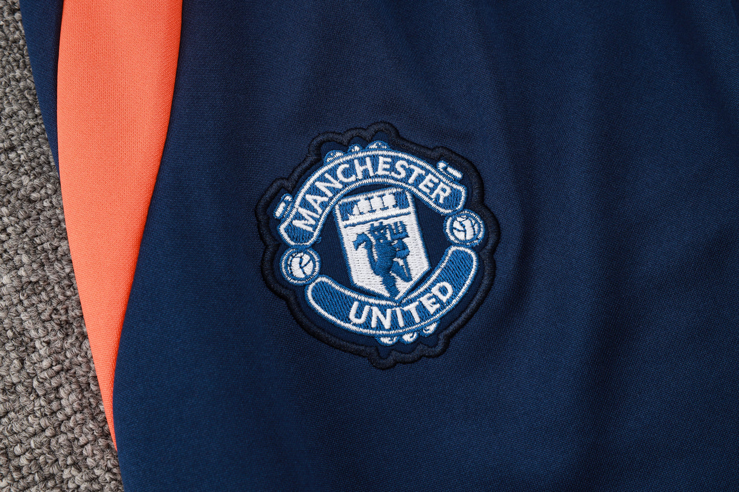 2024/25 Manchester United Presentation Orange/Navy Adults Tracksuit